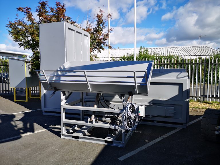 Animal incinerator with loading system